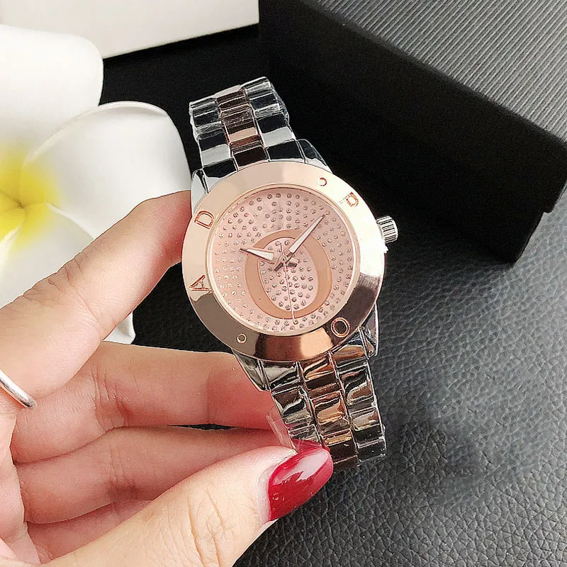 Marque de mode regarde les femmes dames girl cristal gros lettres style metal steel groupe quartz wrist watch p73252i