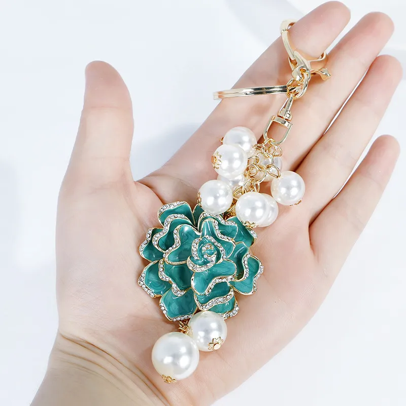 Nueva moda ins diseñador de lujo bonita flor de Camelia mutli perlas borla bolso dijes llaveros para mujeres niñas 214p