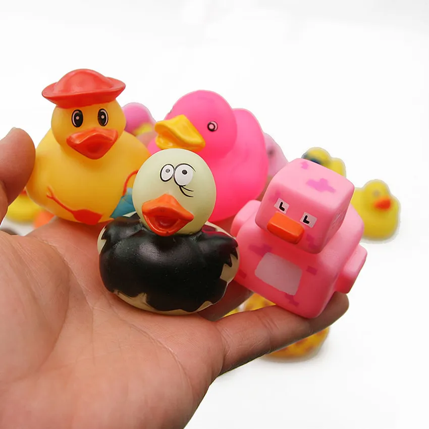 Whole Children bathing Toy Floating Rubber Ducks Squeeze Sound cute lovely duck for baby shower 2050 Random styles LJ2010193913153