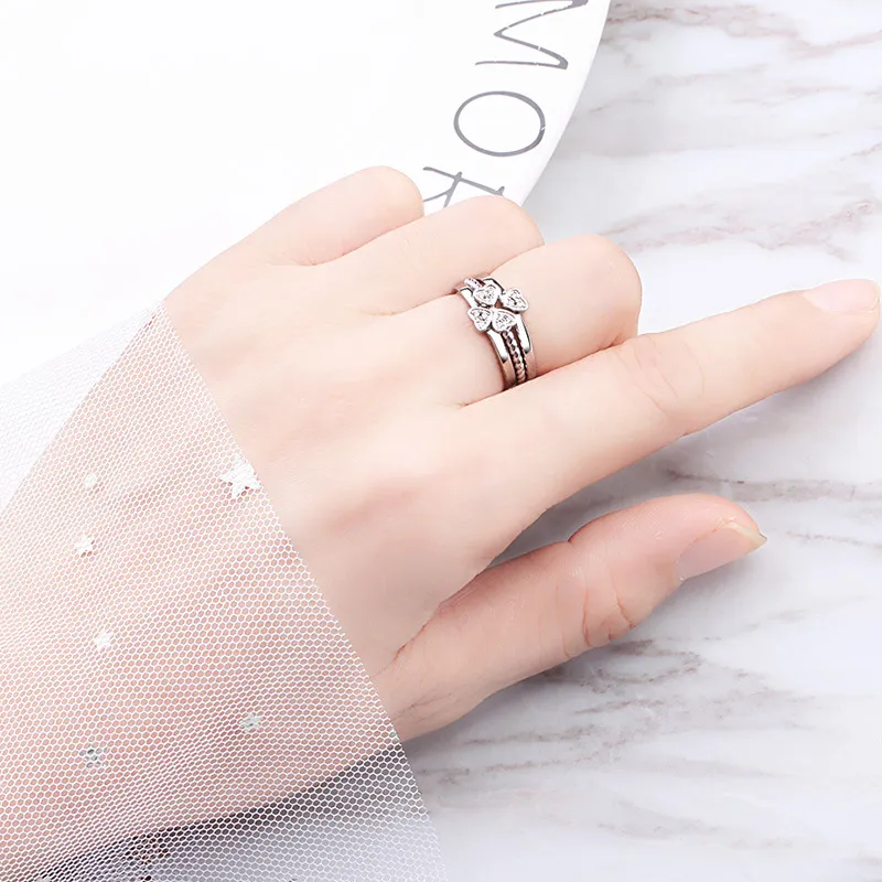 Mode-sieraden ring creatieve vier-blad klaverring voor vrouwen splitsen drie-in-een combinatie opening ring verstelbare maat geschenk J152