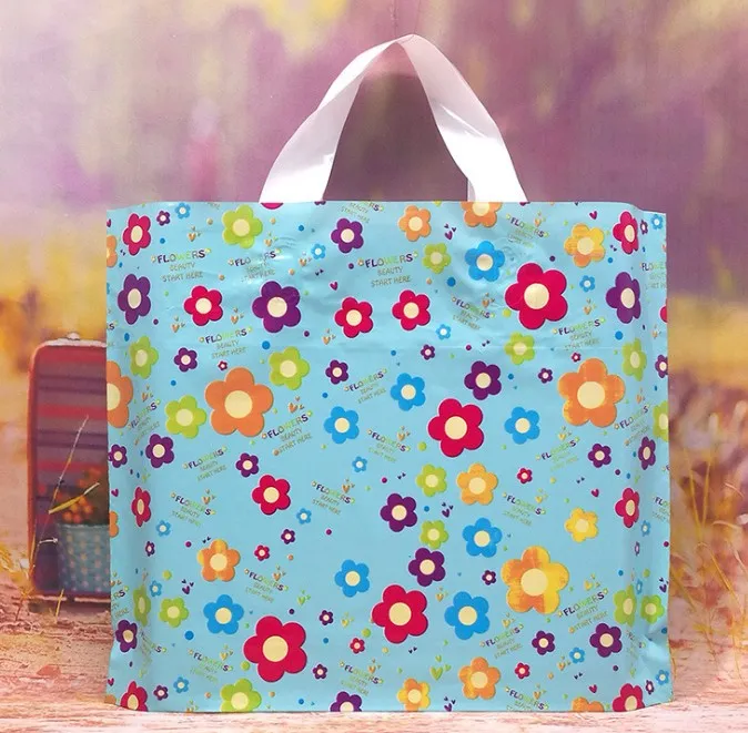 Bolsa de plástico de 50 piezas con mango dibujos animados de flores lindo regalo de regalo de compras grandes bolsas para regalos de regalo282v