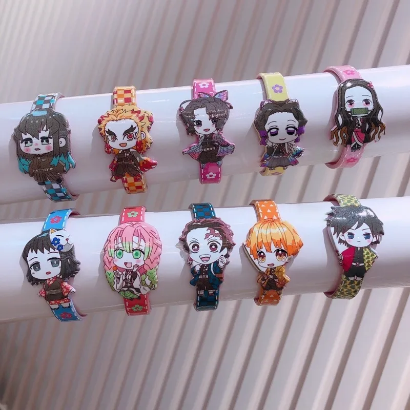 20 pezzi / scatola Anime Demon Slayer Set di braccialetti bambini Stile casuale Braccialetti di cartone animato Gioielli bambini F1211300d