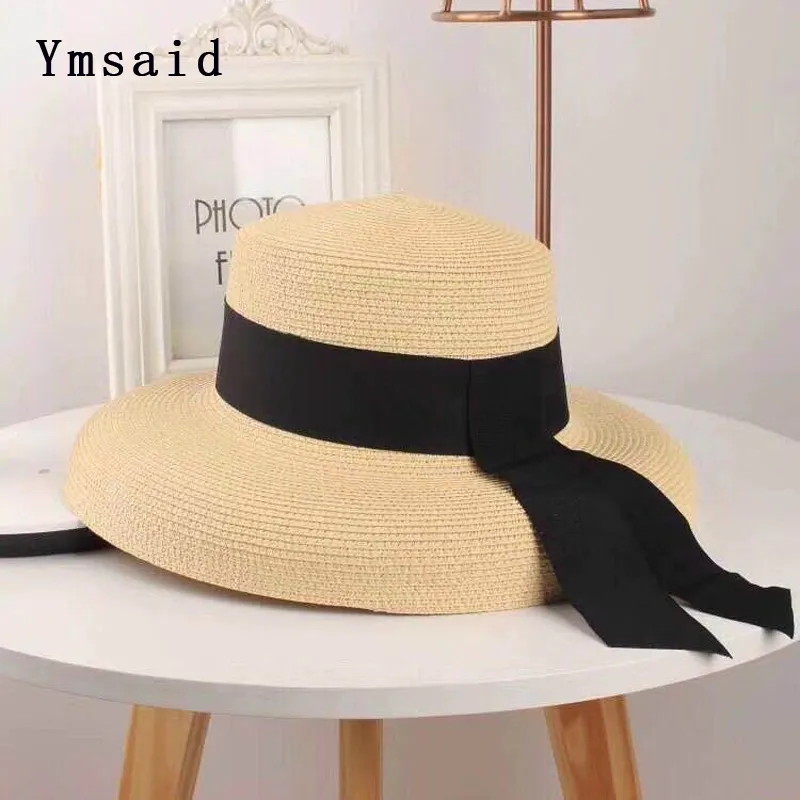 YMSAID Women's Sun Summer Beach Słomy Hat Boater Boater z wstążką na wakacje Audrey Hepburn Y200602261Q