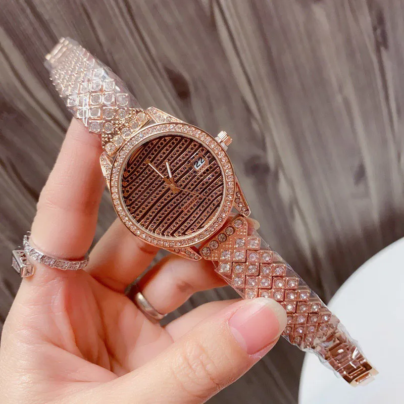 Modemärke kvarts armbandsur för kvinnor Tjej med kristall stil metall stål band Klockor R144