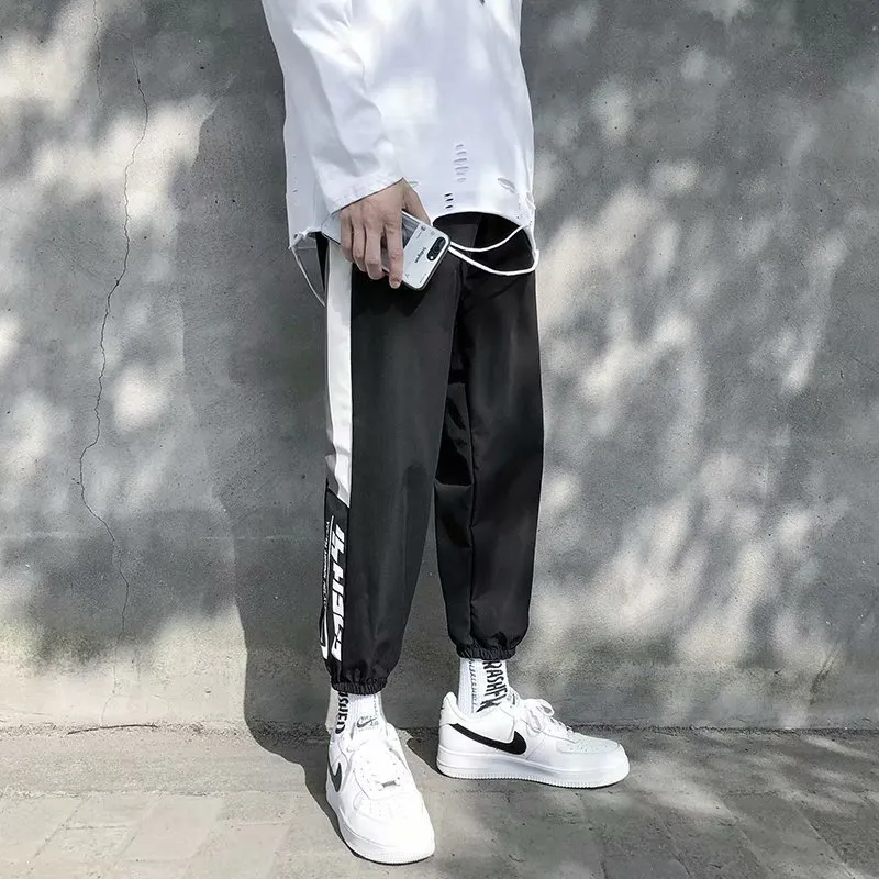 Новый хип-хоп Streetwear Мужская сращивание Joggers Брюки мода повседневные грузовые брюки брюки брюки Gareman Pant Men Student Discount 201110