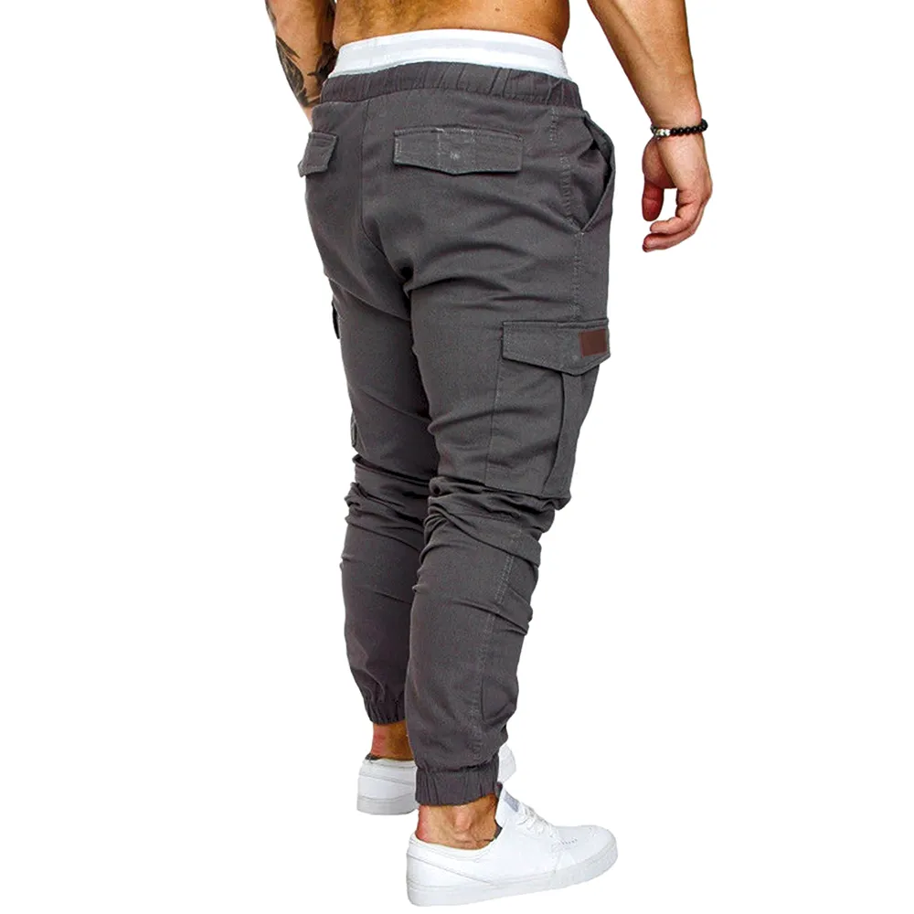 Joggers negros Pantalones de chándal de verano Bolsillos Cordón Streetwear Cargo Hombres Pantalones Pantalones largos elásticos 201110