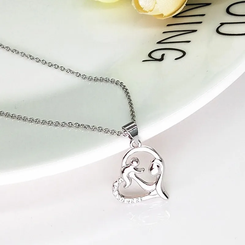 Femmes luxe mode nouveau cadeau de fête des mères amour créatif mère et enfant collier concentrique micro-incrusté Zircon câlin clavicule chaîne