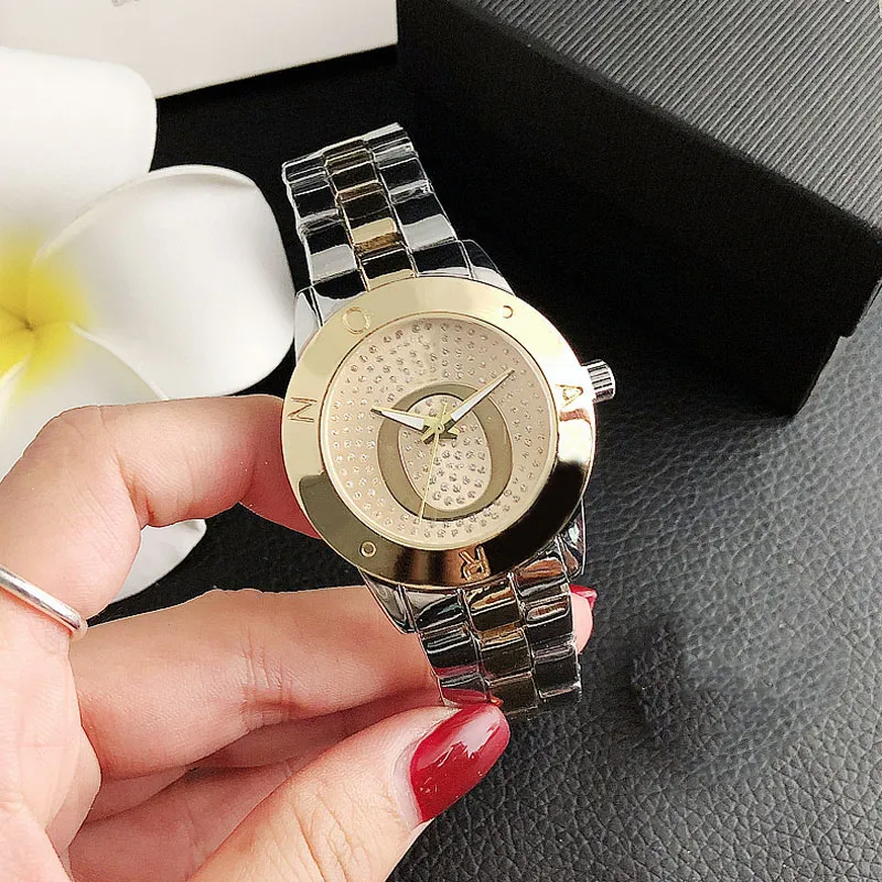 Marque de mode regarde les femmes dames girl cristal gros lettres style metal steel groupe quartz wrist watch p73252i