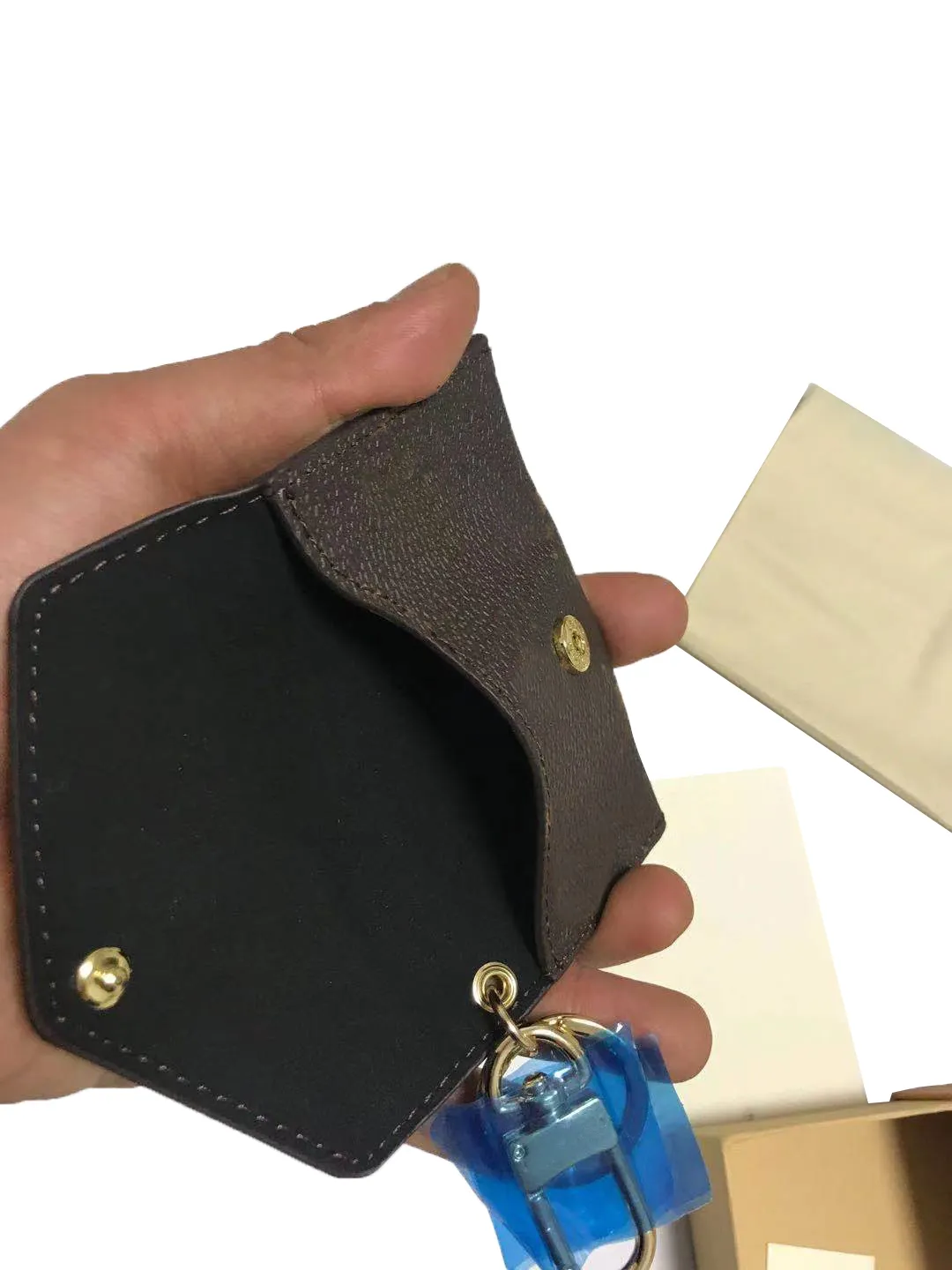 Bolsa de chave de marca premium de couro premium de alta qualidade clássico feminino masculino porta-chaves bolsa de moedas pequena bolsa de chave de couro com caixa 303J