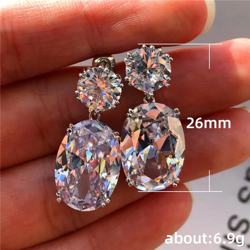 Charmiga kvinnor blöjor örhängen 18k vitt guldpläterat lysande Big Diamond Cz Stone Stud Earings Dingles For Party Wedding Present Nic3132