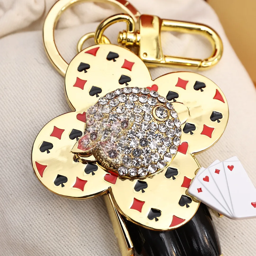 2021 Luxury Metal Vivienne Keychain DJ Famous Brand Sunflower Keychains Emamel Full Diamond Flower Bag Decoration Accessories