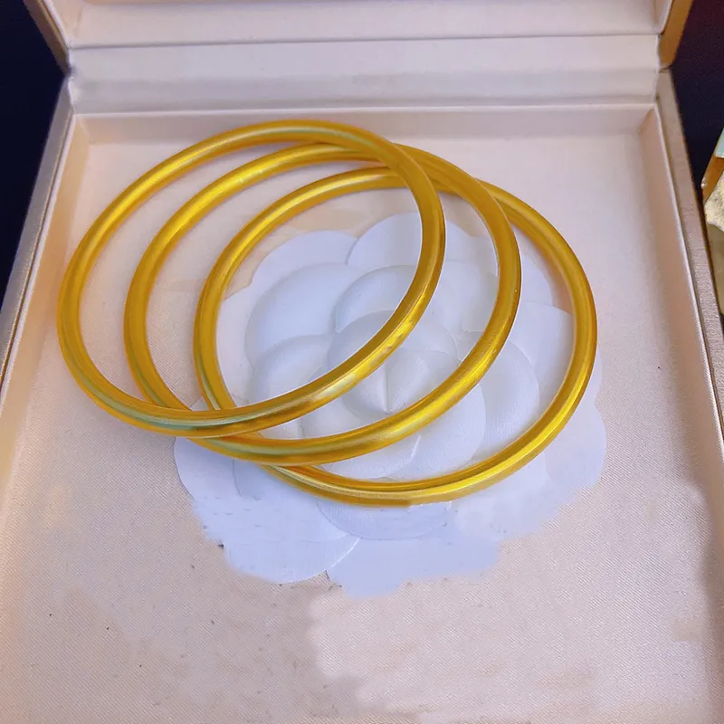 Biżuteria gładkie bransolety 4 mm tytanowe stalowe błyszczące okrągłe 14 -karne złote bransoletki bransoletki dla kobiet i nastolatków290f