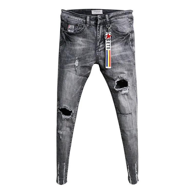 Целая мода повседневные подростки ковбоя корейские модные коленные коленные рваные джинсы скинни скинни мужские необработанные брюки моды 201111199Q
