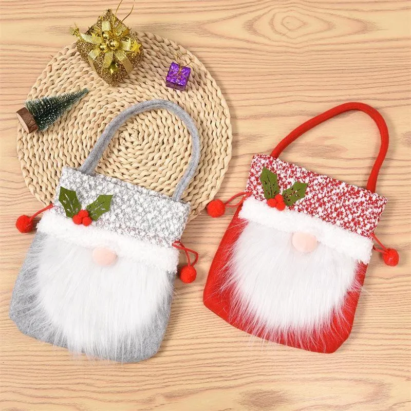 Bez twarzy staruszki Boże Narodzenie prezenty cukierków torby świąteczne dekoracja Eve pakuje torbę sznurek