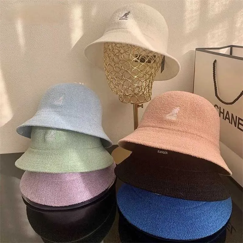 2021 nuovo autunno e inverno nuovo cappello da pescatore Kangol lavorato a maglia cappello da pittore selvaggio di colore solido moda femminile cappello di lana marea H0828