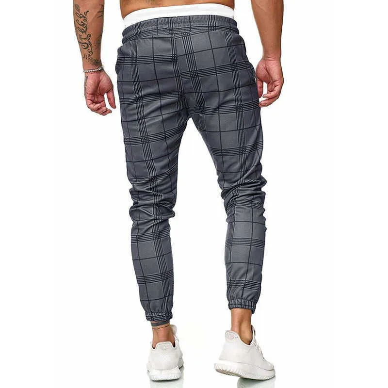 Pantaloni scozzesi pantaloni primaverili e autunnali da uomo da jogging hip-hop abbigliamento da strada moda sportiva harem sciolto da uomo X0615