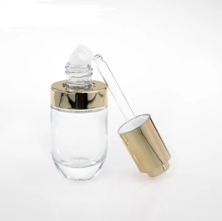 Flacon compte-gouttes de parfum d'huile essentielle cosmétique de 30 ml 30 ml avec bouchon de couvercle de pompe à presse dorée SN276