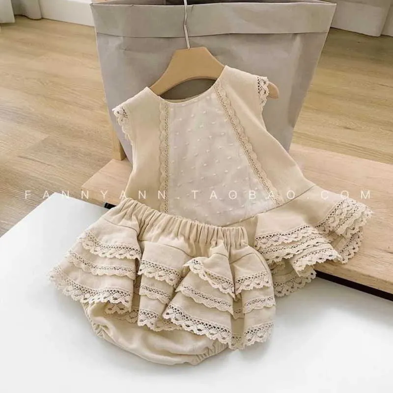 Set da 2 pezzi ragazza estiva all'ingrosso Top senza maniche in pizzo beige + pantaloncini Vestiti bambina E2132 210610