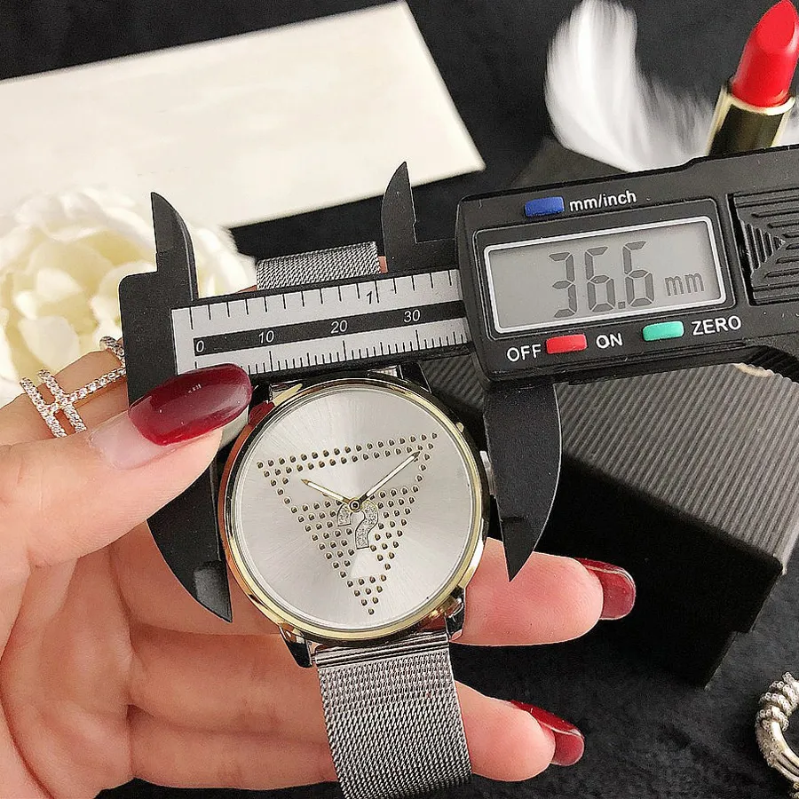 Marka mody kobiet dziewczyna Crystal Triangle Znak zapytania Styl metalowy zespół kwarcowy zegarek GS38259E