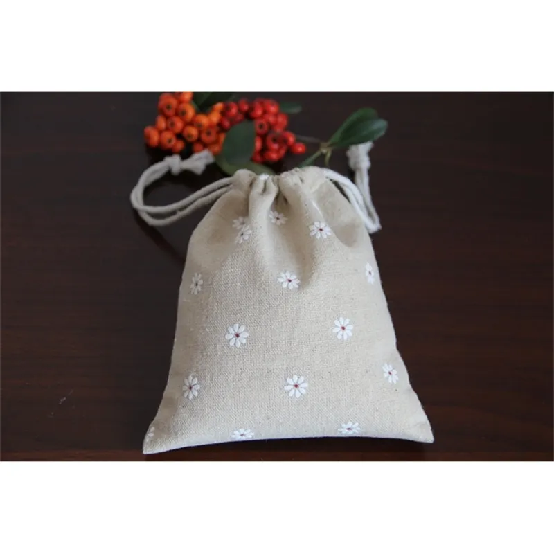 Pochettes cadeaux en lin marguerite blanche 8x10cm 9x12cm 11x14cm 13x17cm paquet de 50 sacs de bonbons de fête bijoux sacs à cordon