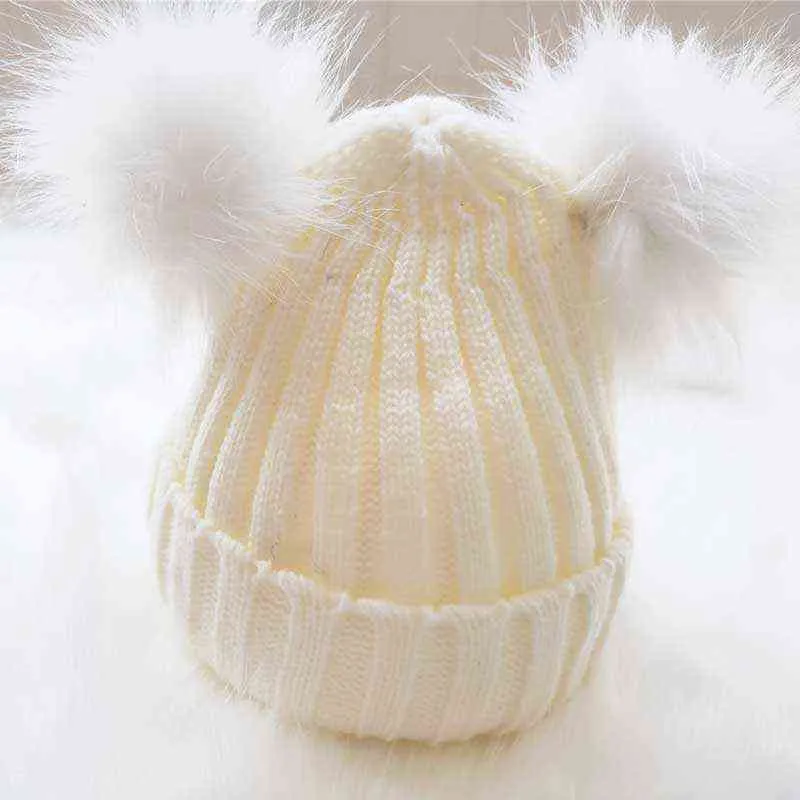 男の子の女の子の冬の帽子の暖かい綿のニットビーニー帽子の毛皮の帽子のための生まれたばかりの赤ちゃんの帽子