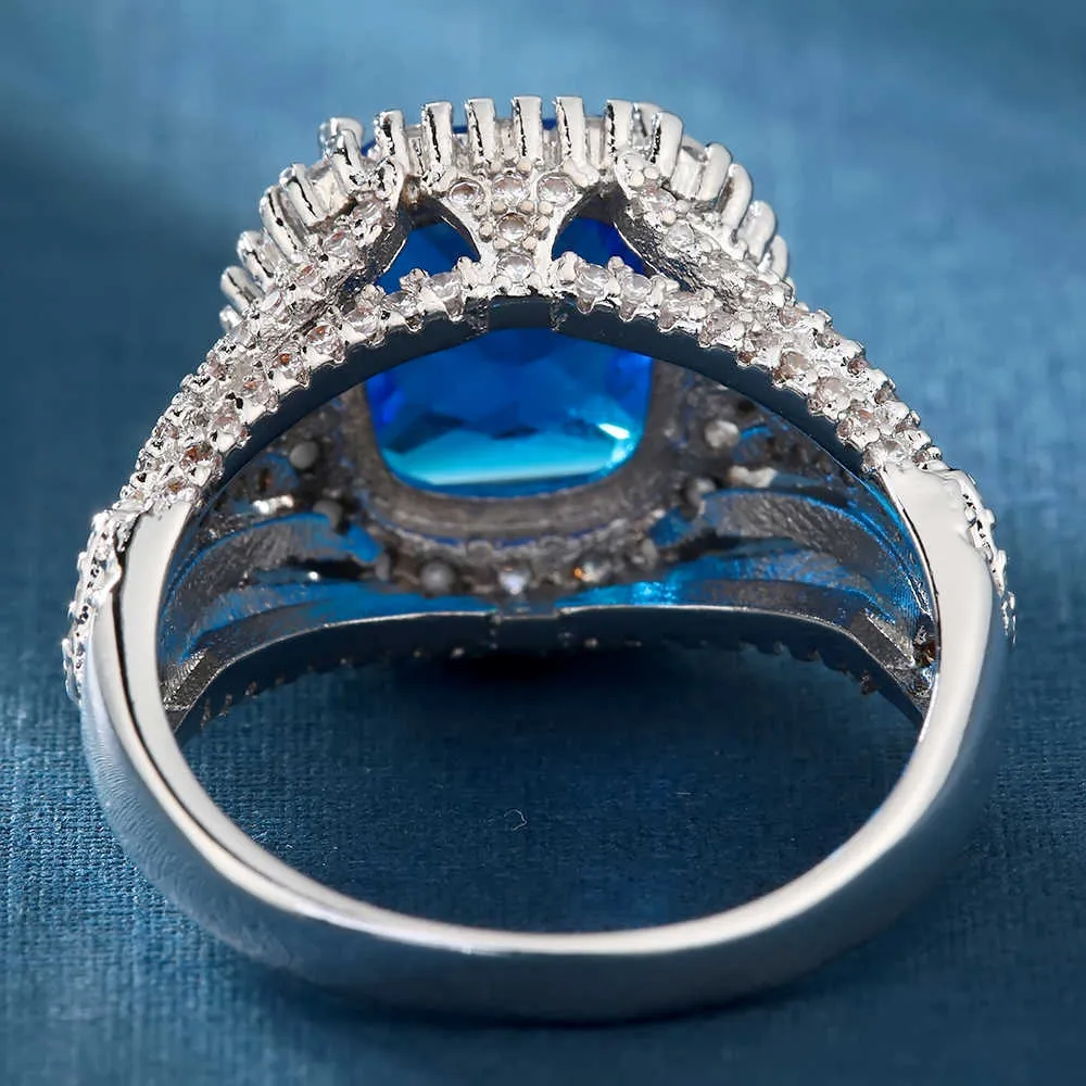 フルマイクロパイヴ立キュービックジルコニアロイヤルブルーラウンドリングジュエリーシルバーカラー女性ブライダルx0715のためのエレガントな結婚式と婚約指輪