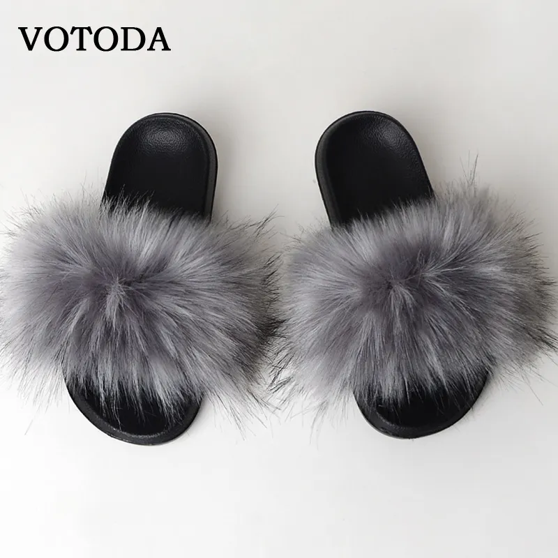New Fluffy Faux Slides Pantofole da donna Furry Raccoon Sandali Finta pelliccia di volpe Infradito Home Fuzzy Donna Scarpe casual in peluche Y200423