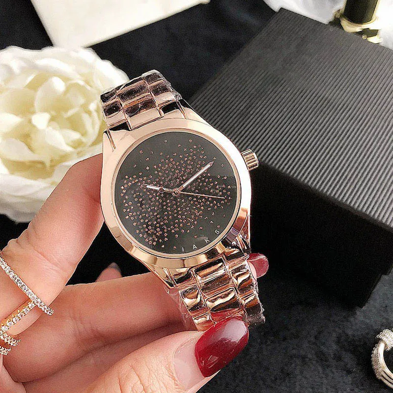 Marque de mode montres femmes fille cristal grandes lettres style métal acier bande Quartz montre-bracelet M118