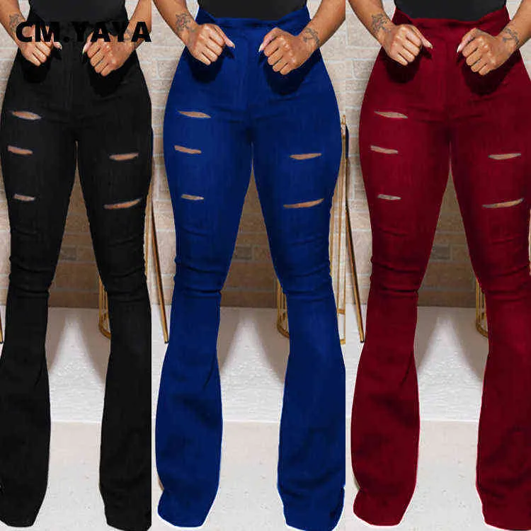 CM.YAYA grande taille trou pantalon femmes pleine longueur maigre taille élastique solide Flare pantalon printemps automne haute couture dame pantalon 211124