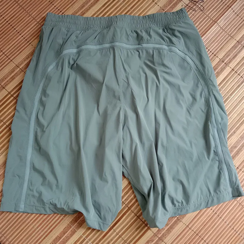 L-008 Calções de corrida masculinos para treino ao ar livre, roupa de calça 2 em 1 para esportes furtivos, academia, ioga, calça de moletom de marca masculina