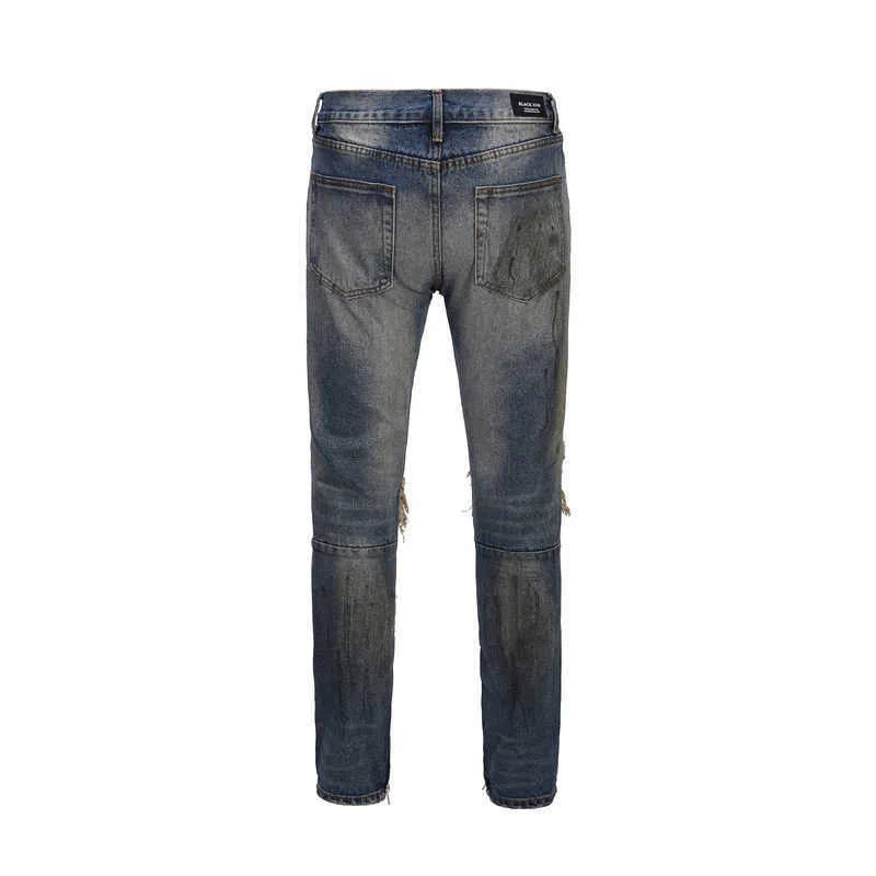 Jeans pour hommes Gros trou jean sale trou au genou