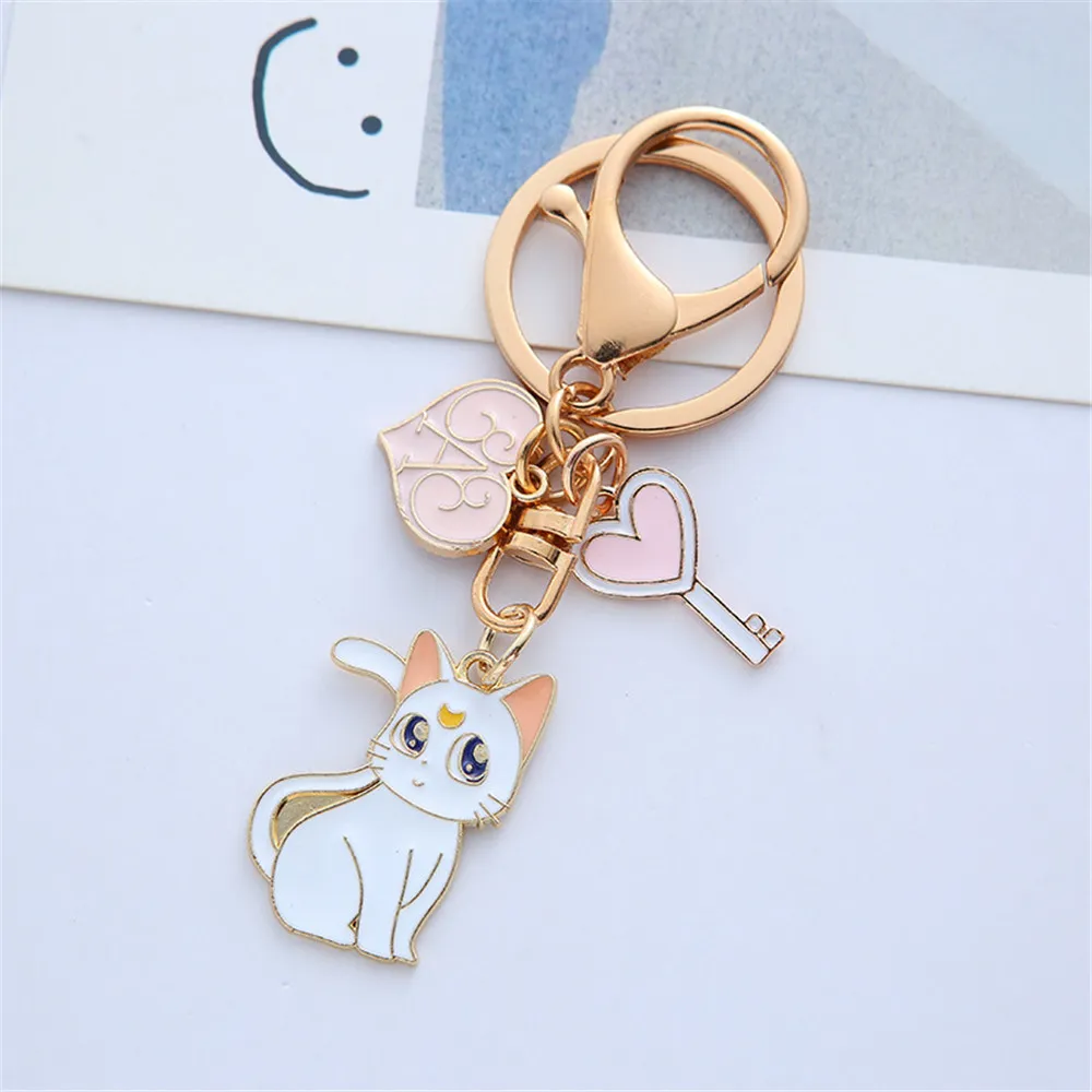 Sailor Moon Keychain süße Katzenmädchen -Autos Schlüsselkette Kreatives Design Cartoon süßes Paar Geschenktüte Anhänger Women Metal Charme Schlüsselring