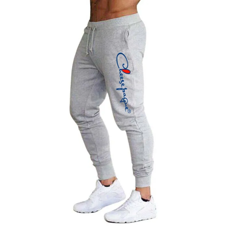 Marka nadruk w litery Muscle Fitness spodnie do biegania sporty treningowe spodnie bawełniane męskie oddychające Slim Beam Mouth Casual Health Pant