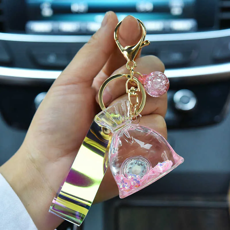 New Acrylic Glow Lucky Bag Liquid Keychain Creative Quicksand Bottle Key Chain Women Bag Pendant Car Keyring Trinket Lovely Gift G1019
