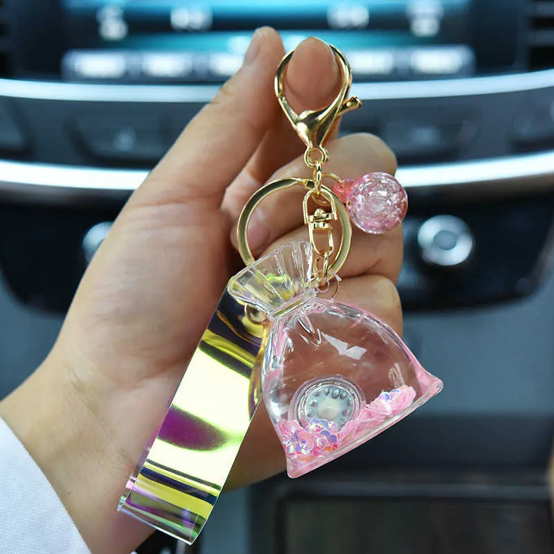 New Acrylic Glow Lucky Bag Liquid Keychain Creative Quicksand Bottle Key Chain Women Bag Pendant Car Keyring Trinket Lovely Gift G8409199