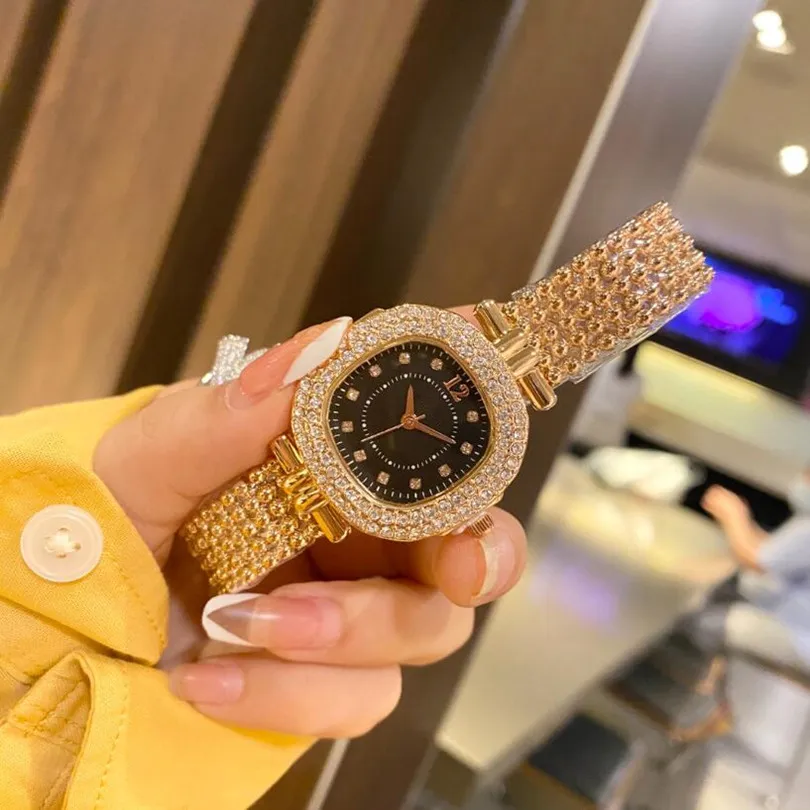 Moda luksusowe złoto zegarki dla kobiet zegarki damskie damskie na rękę ze stali nierdzewnej mrożone diamenty słynne marki bransoletki clock241q