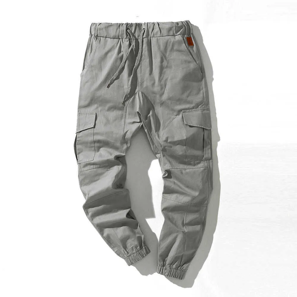 Streetwear Hommes Pantalons de survêtement Mode Cargo Pantalon Taille élastique Pantalon Hip Harem S Multi Poche Travail 210715