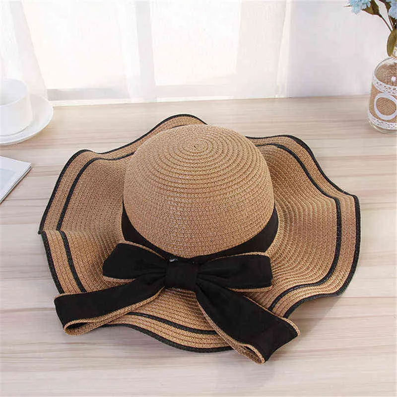 New Summer Women's Boater Beach Hat Wide side Female Casual Panama Hat Lady Classic Flat Bowknot Straw Sun Hat Women wavy Girl G220301