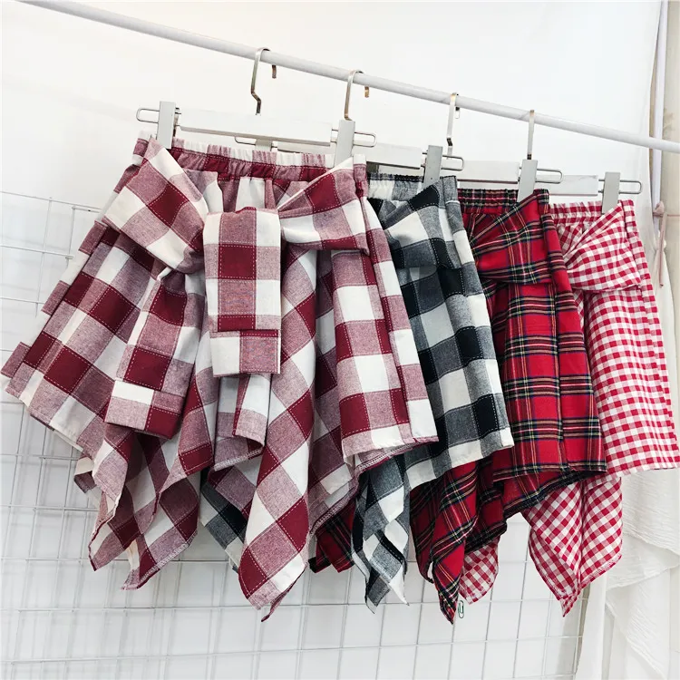 Frauen Plaid Gedruckt Röcke Unregelmäßige Sommer Shirts Röcke Elastische Taille College Stil Mini Rock Jupe Femme DK6054 210315