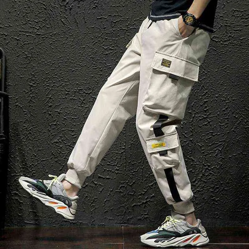 Nuevos pantalones de primavera para hombre Cargo Jogger cintas Hip Hop Casual Joggers para hombre pantalones moda Streetwear Harem pantalones H1223