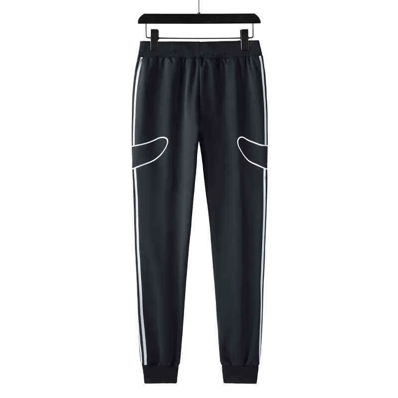 Pantalones de chándal hombres elásticos sueltos estiramiento pista harem pantalones hombre más tamaño grande 7xl 8xl joggers deportes coreano streetwear pantalones masculinos 211112