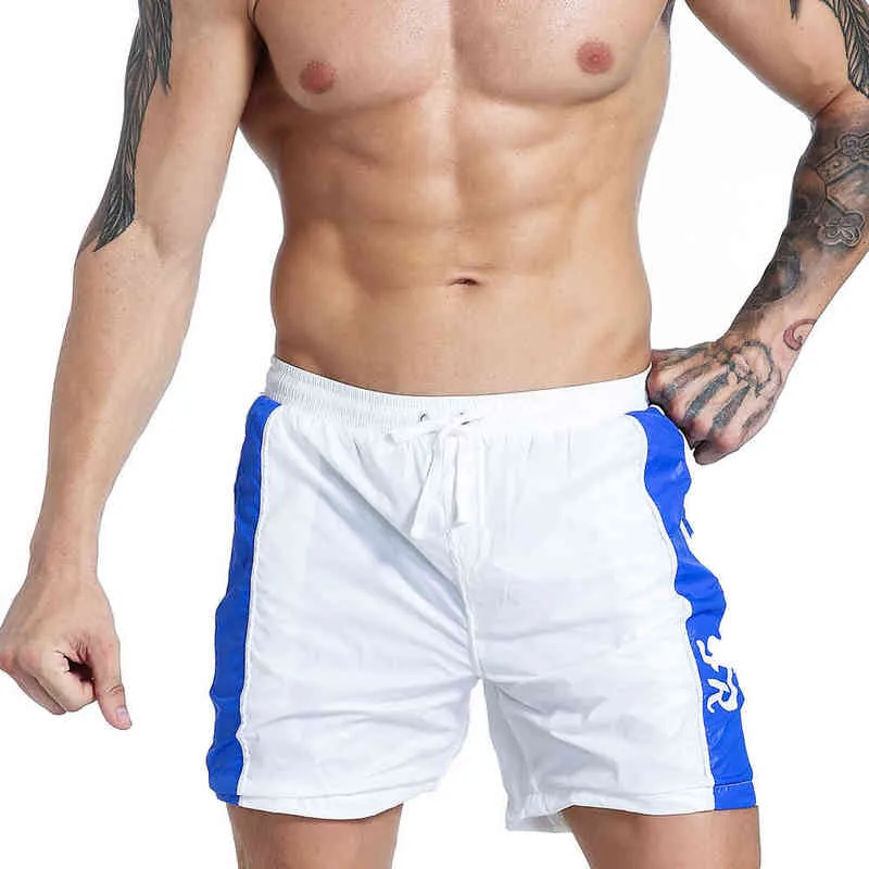 Pantaloncini da bodybuilding fitness da uomo Pantaloncini da palestra estivi da uomo Allenamento da uomo Pantaloni corti da spiaggia da jogger traspiranti traspiranti H1210