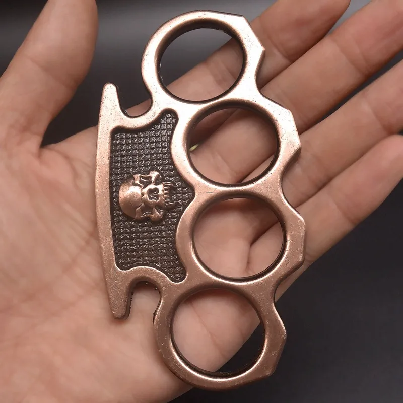 Skull Fist Buckle Metal Knuckle Duster Four Finger Tiger Outdoor Camping Tasca autodifesa Strumenti EDC