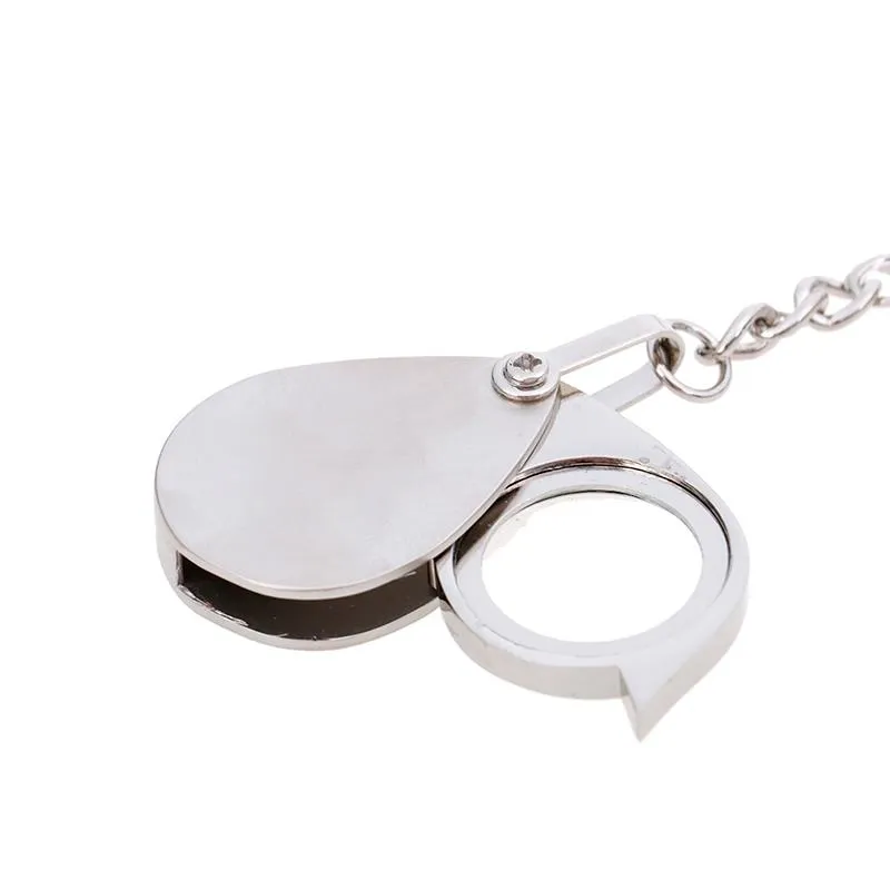 Keychains handhållna loupe fällficka 10x 15x Förstoringsstorningsglaslins med nyckelring bärbar metall silver färg277a