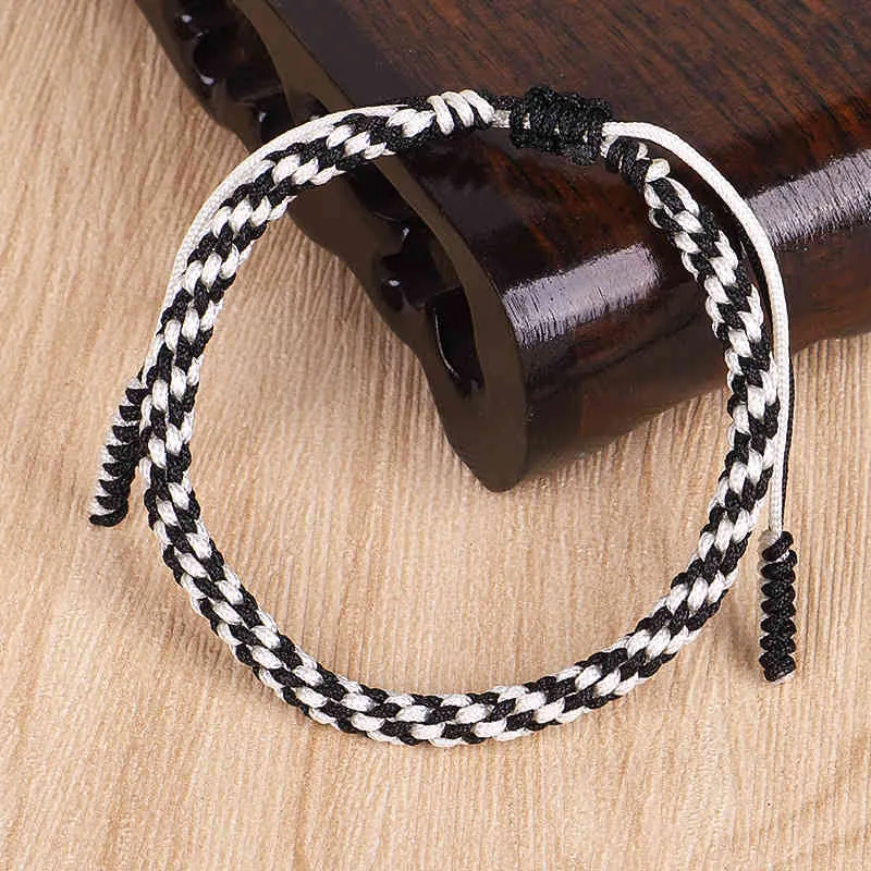 Zwart -witte draad creatief geweven armband handgemaakte armband maïs knoop tibetan armband cadeau