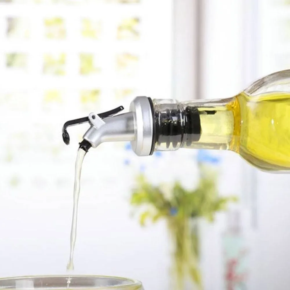Utensilios de cocina Pulverizador de aceite de oliva Tapón Dispensador de licor Vertedor de vino Tapa abatible Tapa de botella de cerveza Tapón Varilla de liberación de agua pour6253442