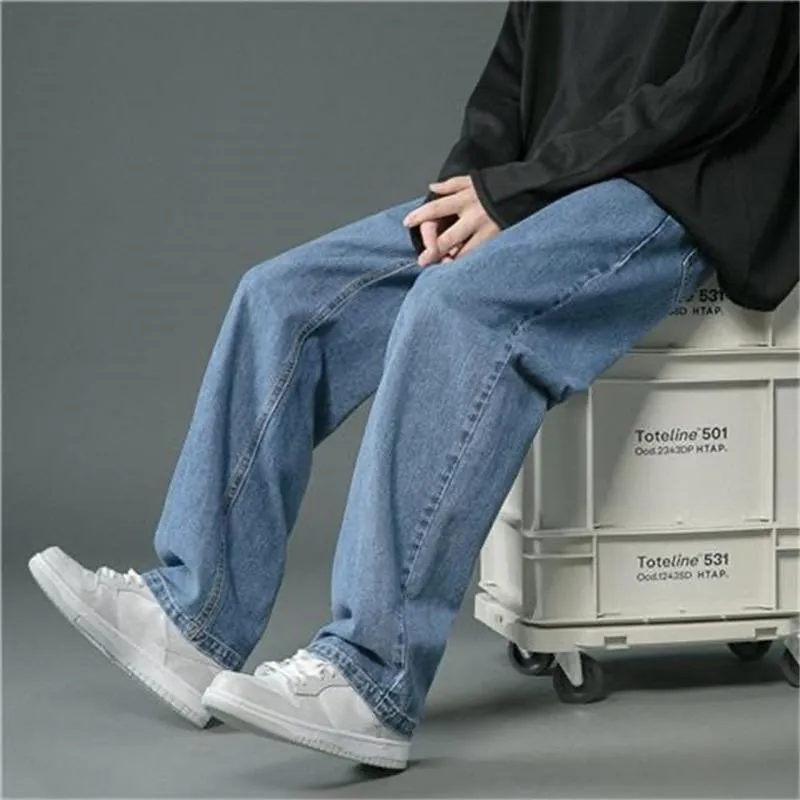 Streetwear workowane dżinsy mężczyźni plus size S-5xl moda luźna prosta szeroka nogi spodnie czarne jasnoniebieskie męskie odzież 220228