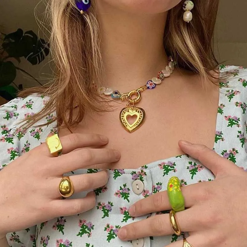 Collana con clip a forma di fiore a coda di pesce speciale di alta qualità con cuore bianco placcato in oro 18 carati