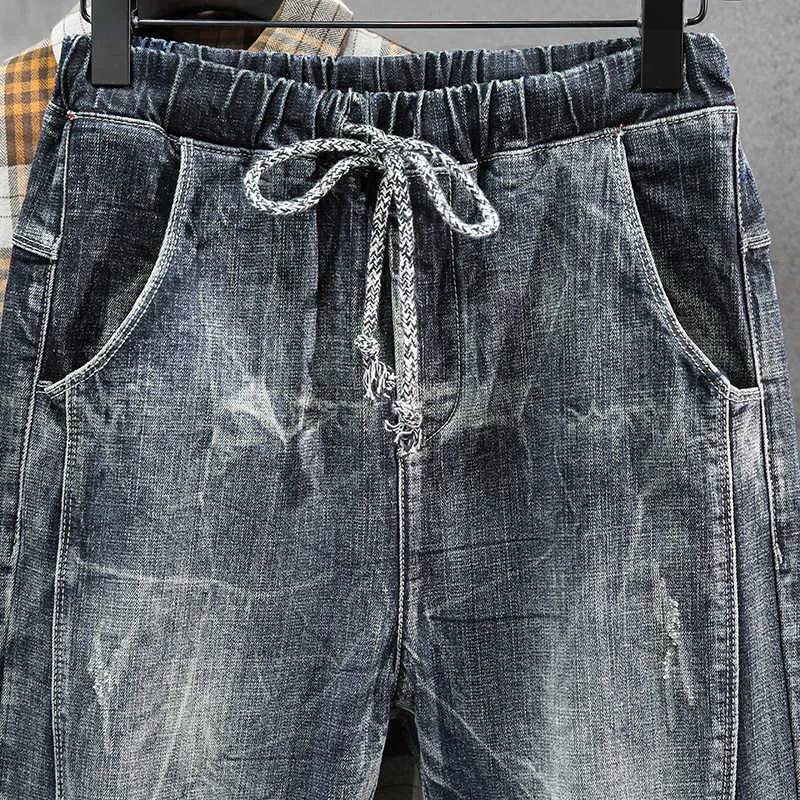 Joggare jean män motorcykel jeans streetwear dragsko elastiska midja ruched byxor fritid ridning jeans man plus storlek 42,035 x0621