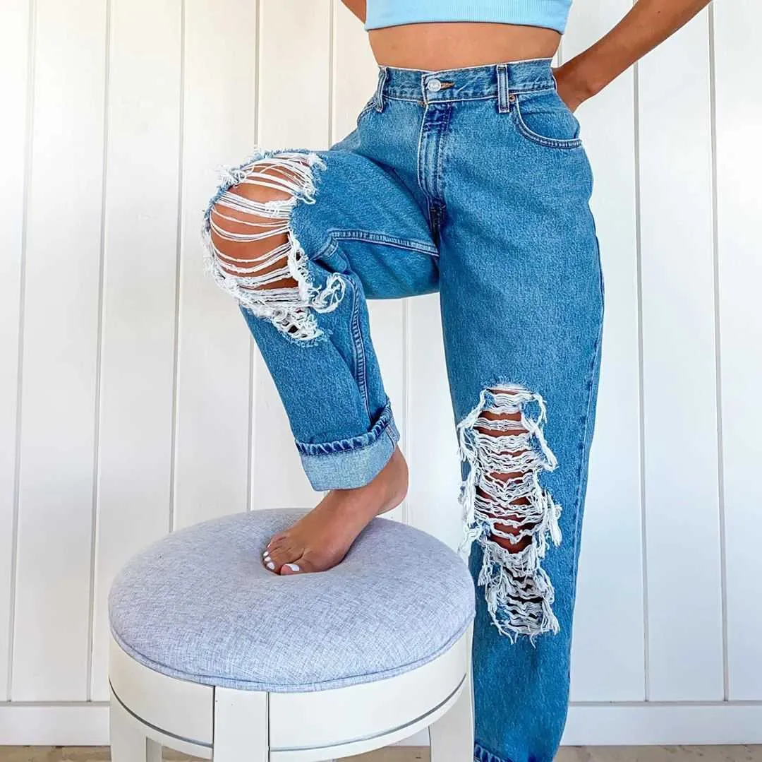 I jeans da donna alla moda con i fori strappati sembrano pantaloni da pantaloni larghi e larghi da strada 210809
